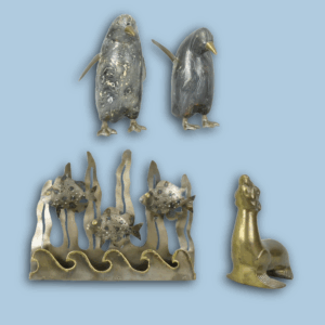 Penguins, Seal, and Fish Sculptures
