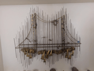 Photograph of lot#108, Mid-Century Modern Curtis Jere Brutalist Wall Sculpture of a bridge with birds.